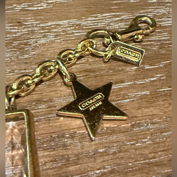 Coach Gold Tone Multi Charm Bracelet. Includes locket Heart, Bird, Star and more - Picture 11 of 17